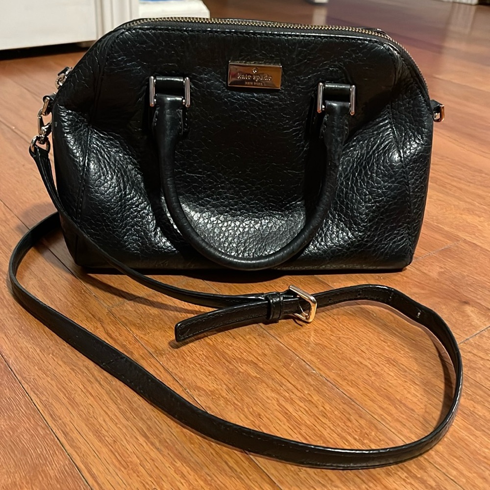 Black Kate Spade bag. Handbag/crossbody bag. Measuring: 7L X 11W. Leather.